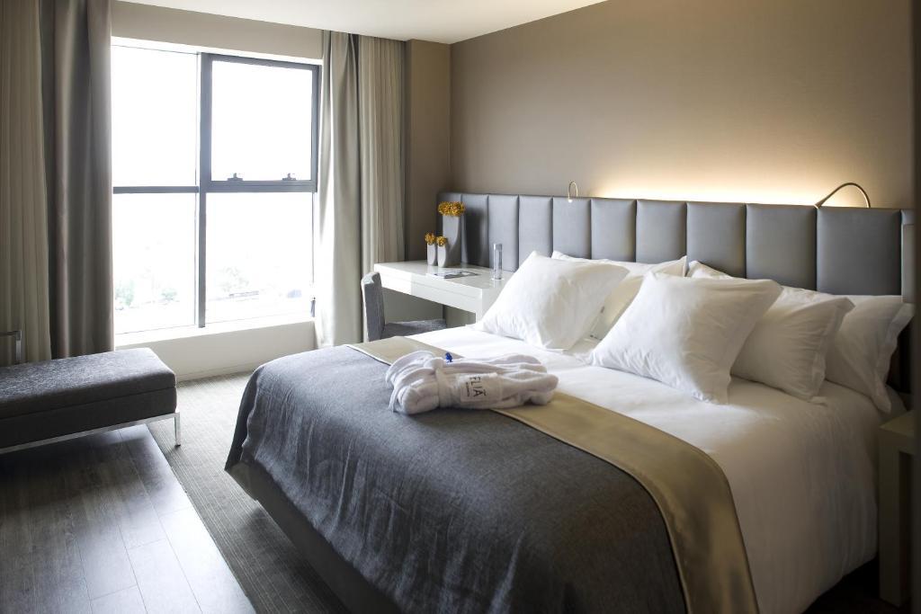 Melia Braga Hotel & Spa المظهر الخارجي الصورة A room at the hotel