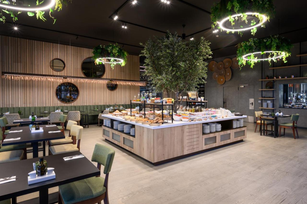 Melia Braga Hotel & Spa المظهر الخارجي الصورة The interior of the restaurant